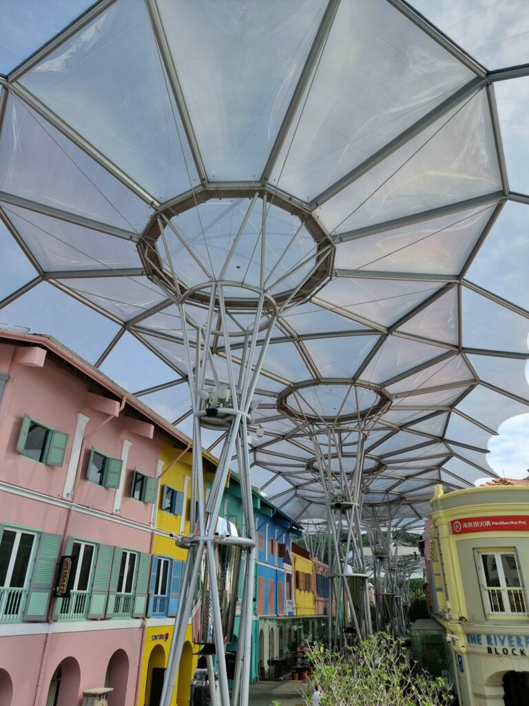 ETFE Singapore: Clarke Quay’s canopy upgrade uses 10,099 m² of printed ETFE panels to reduce heat, let daylight through, and improve comfort in this riverside precinct.