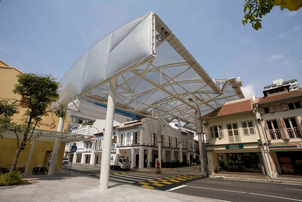 ETFE foil roof at China Square Central transforms Singapore’s Nankin Street into a shaded, open-air public space.
