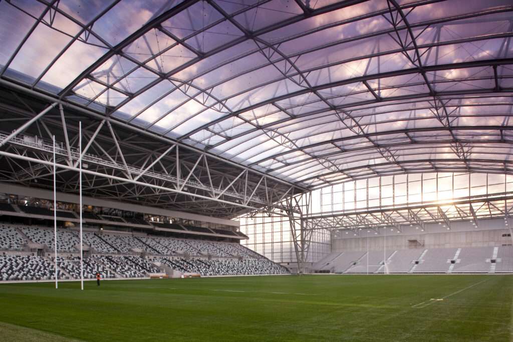 ETFE New Zealand: Forsyth Barr Stadium features a lightweight ETFE roof that supports natural turf growth while providing full weather protection for major events.