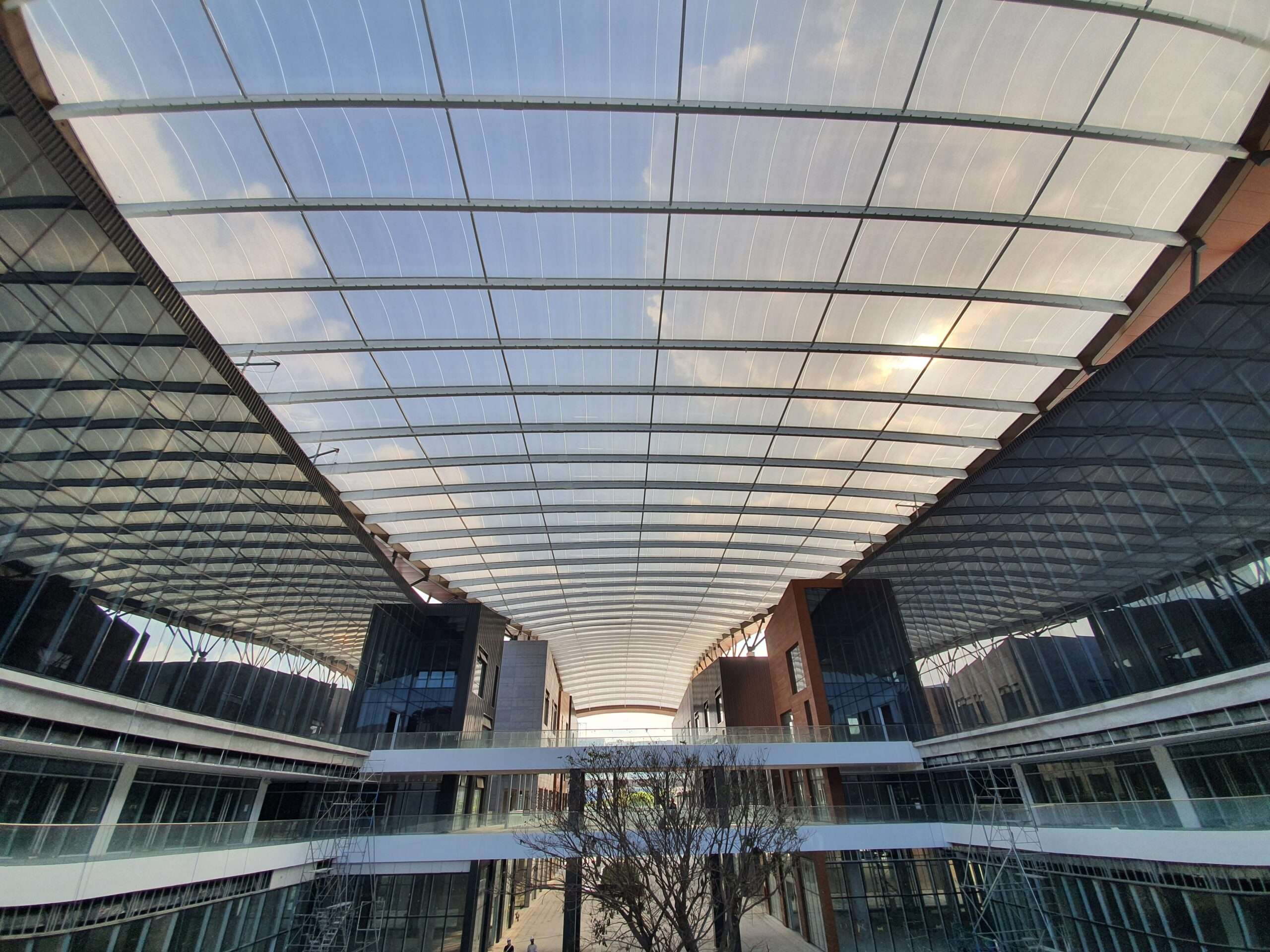 ETFE Philippines: Aseana Parqal features 8,250 m² of elevated ETFE canopies that deliver daylight, shading and low maintenance for Manila’s retail boulevard.