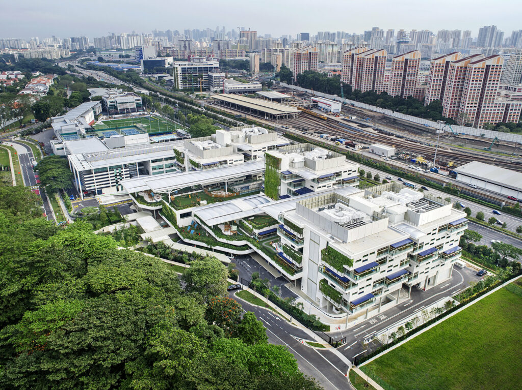 ETFE Singapore: Early Learning Village in Singapore uses 3,000 m² of ETFE canopies to shelter outdoor play, learning and pool spaces with UV protection and daylight control.