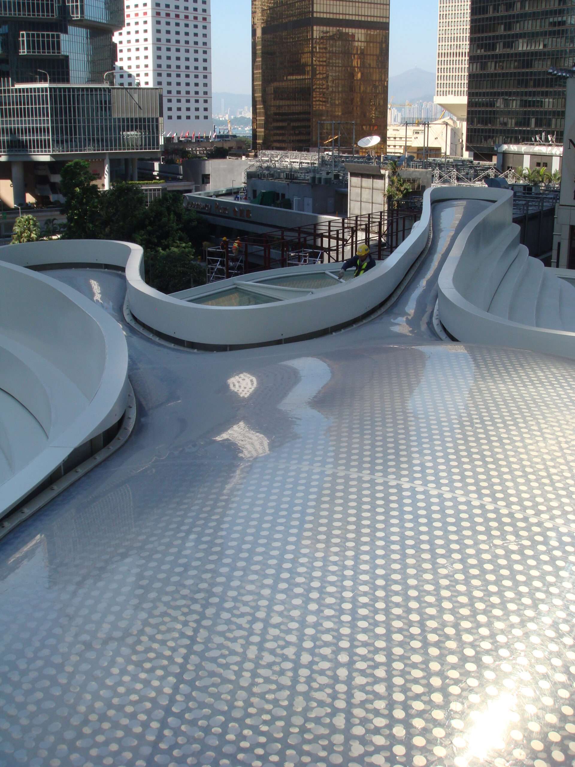 ETFE Hong Kong: Pacific Place’s L4 restaurant features a unique ETFE skylight that floods the dining space with natural light under a custom ink-splatter form.