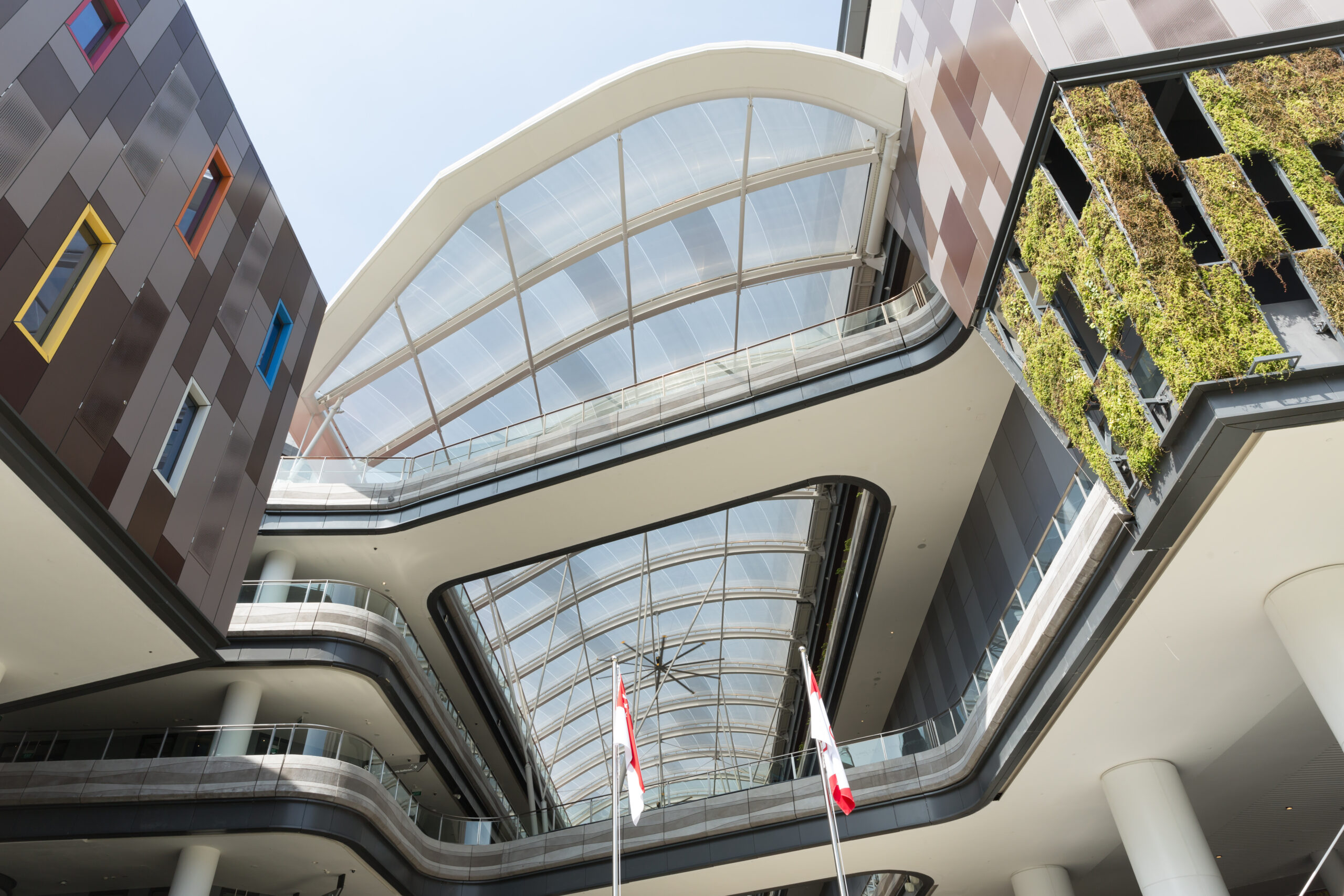ETFE Singapore: Our Tampines Hub features a 3,600 m² two-layer ETFE canopy with custom print shading, delivering comfort, daylight and community space openness.