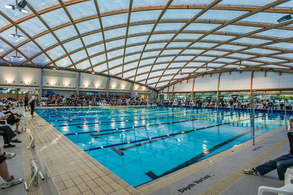 ETFE New Zealand: Coastlands Aquatic Centre features a double-curved ETFE roof over a timber structure, delivering daylight, efficiency and award-winning sustainable performance.