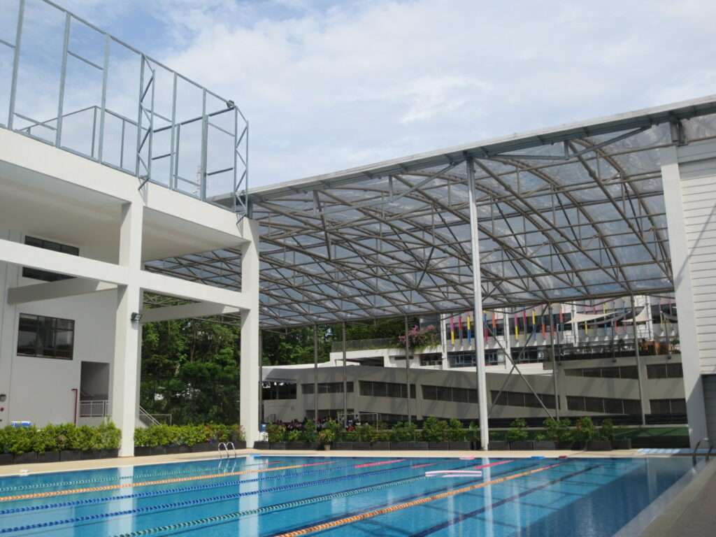 ETFE Malaysia: British International School KL features a 2,800 m² ETFE canopy that provides UV protection and all-weather shelter for outdoor play and school events.