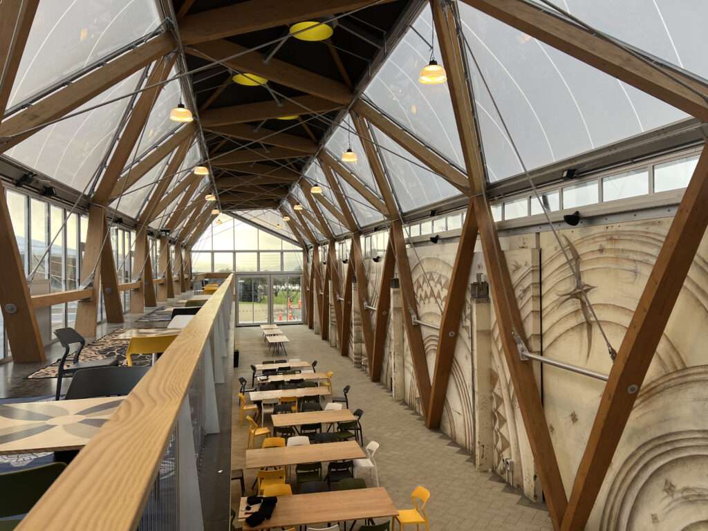 ETFE New Zealand: Kai Tahi Porirua features a 442 m² ETFE roof and facade system that provides light, weather protection and sustainability for a community dining and retail hub.