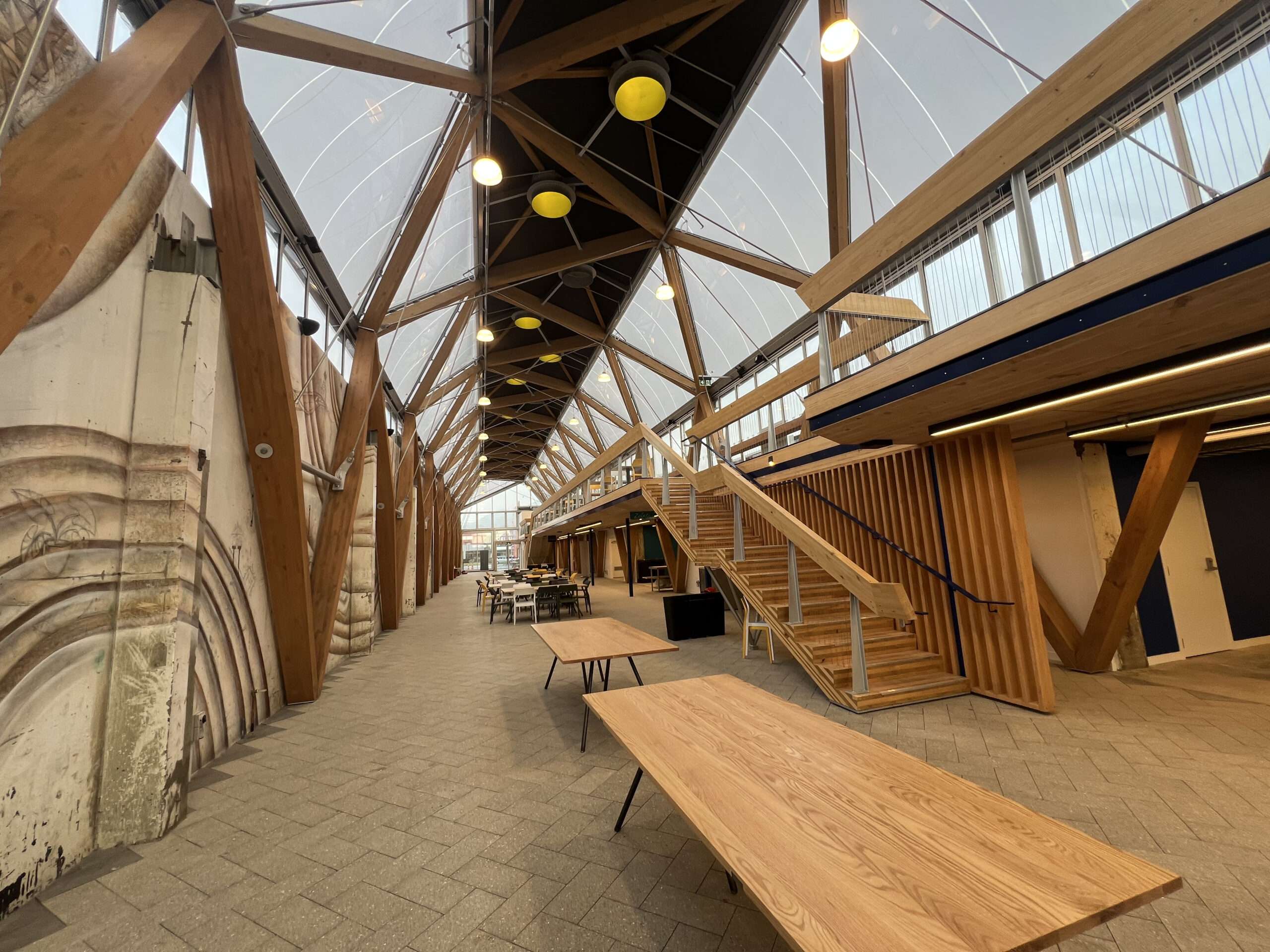 ETFE New Zealand: Kai Tahi Porirua features a 442 m² ETFE roof and facade system that provides light, weather protection and sustainability for a community dining and retail hub.