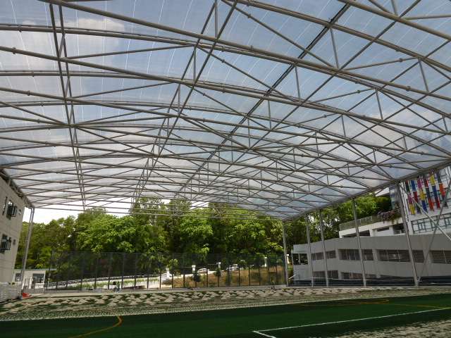 ETFE Malaysia: British International School KL features a 2,800 m² ETFE canopy that provides UV protection and all-weather shelter for outdoor play and school events.