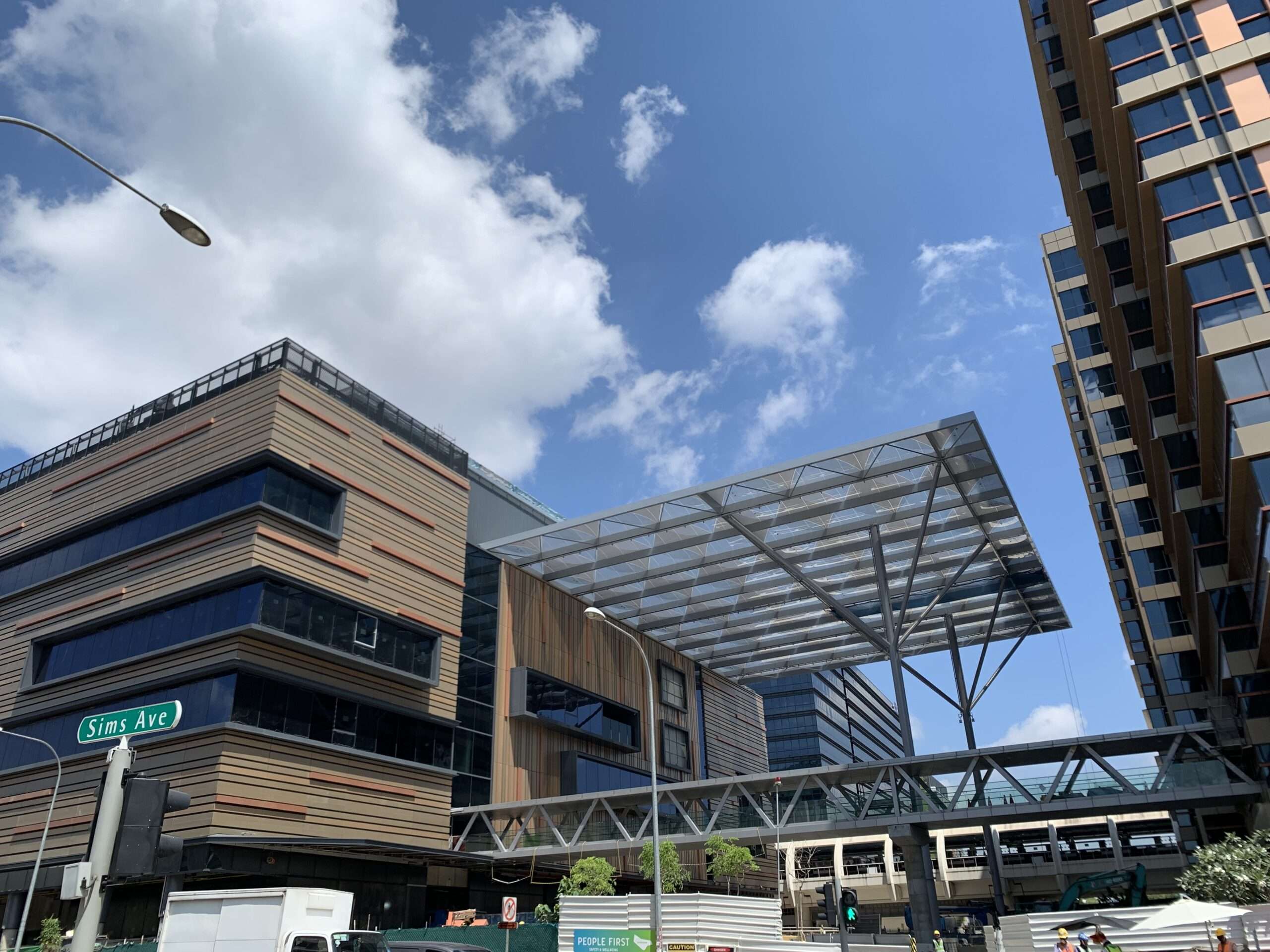 ETFE Singapore: Paya Lebar Quarter features a printed ETFE canopy providing lightweight shade and rain protection for a central public plaza.