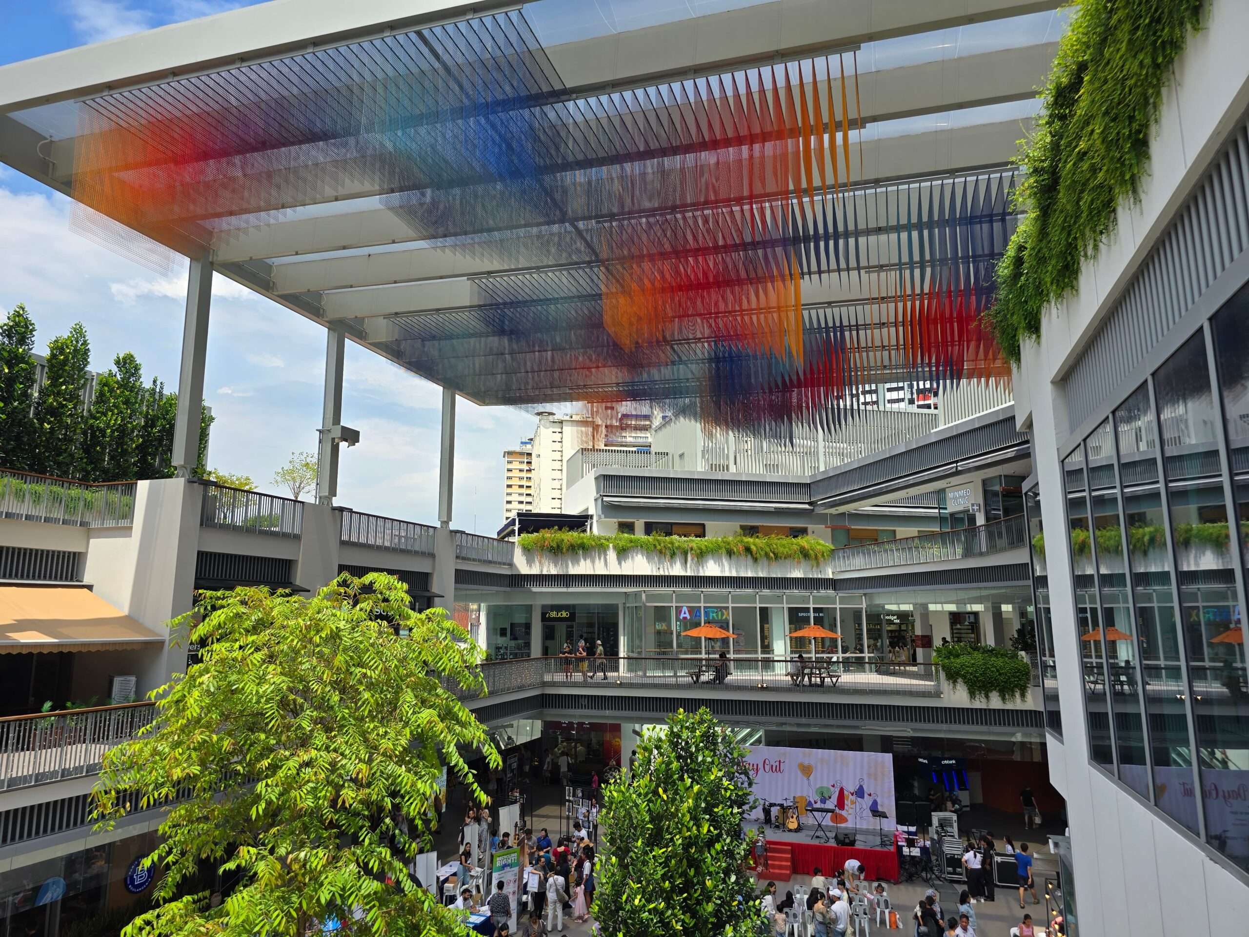 One Holland Village in Singapore features a 540 m² ETFE canopy that brings daylight, shading and lightweight design to a mixed-use community hub.