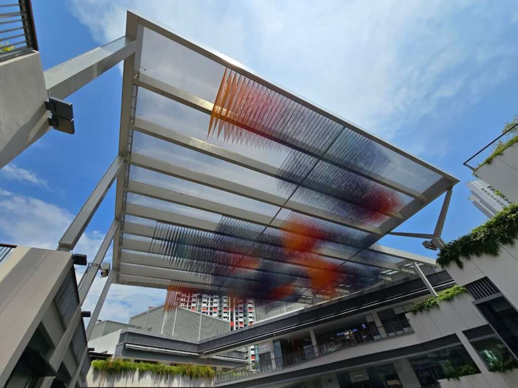One Holland Village in Singapore features a 540 m² ETFE canopy that brings daylight, shading and lightweight design to a mixed-use community hub.
