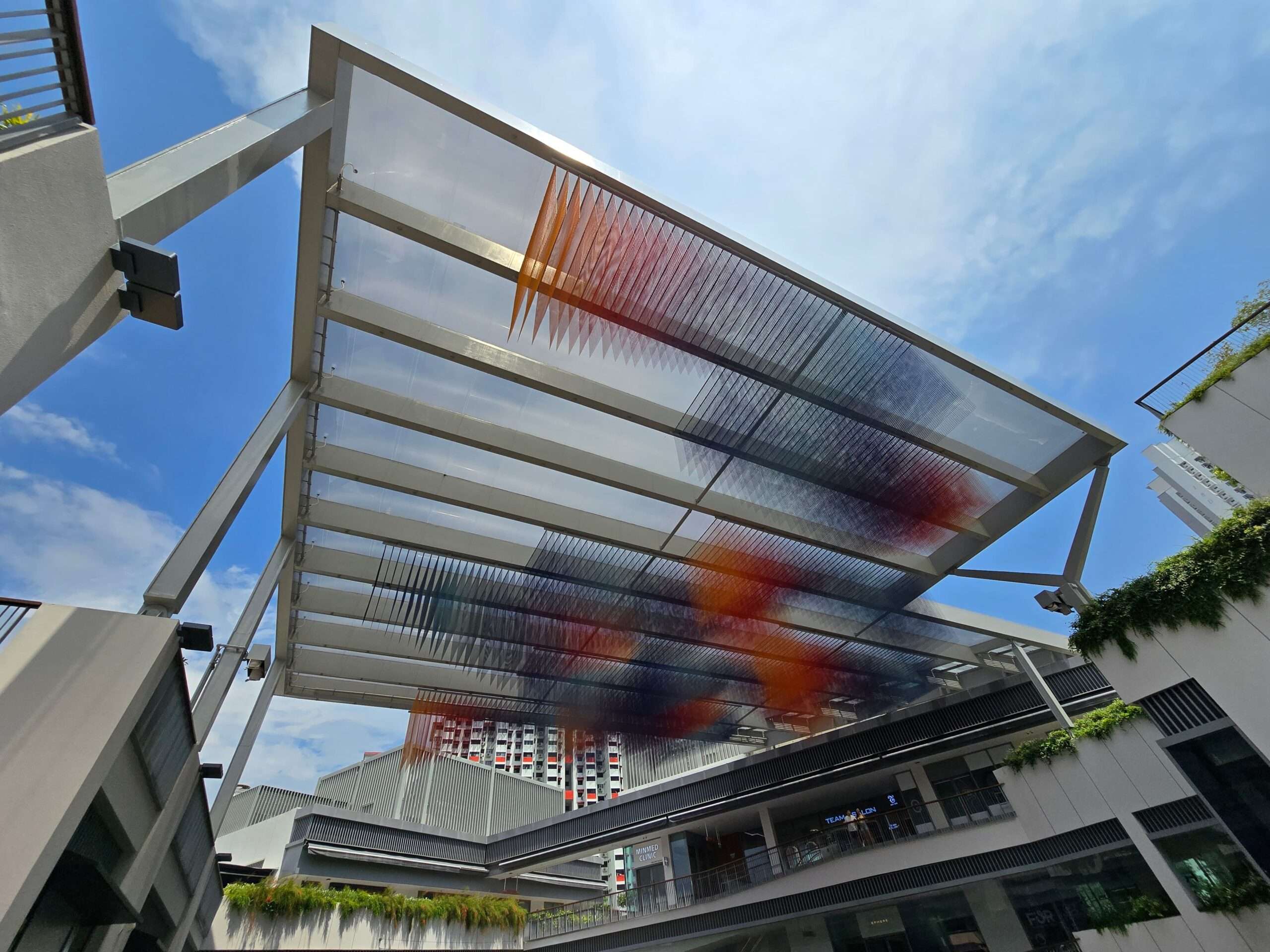 One Holland Village in Singapore features a 540 m² ETFE canopy that brings daylight, shading and lightweight design to a mixed-use community hub.