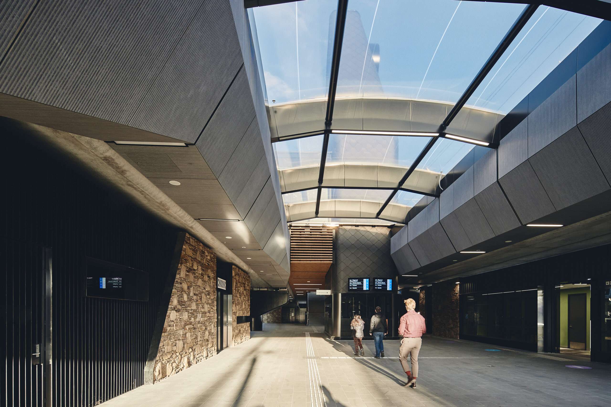 ETFE Australia: Mooroolbark Station in Melbourne features a 220 m² ETFE atrium designed for lightweight performance, daylight and movement between train tracks.