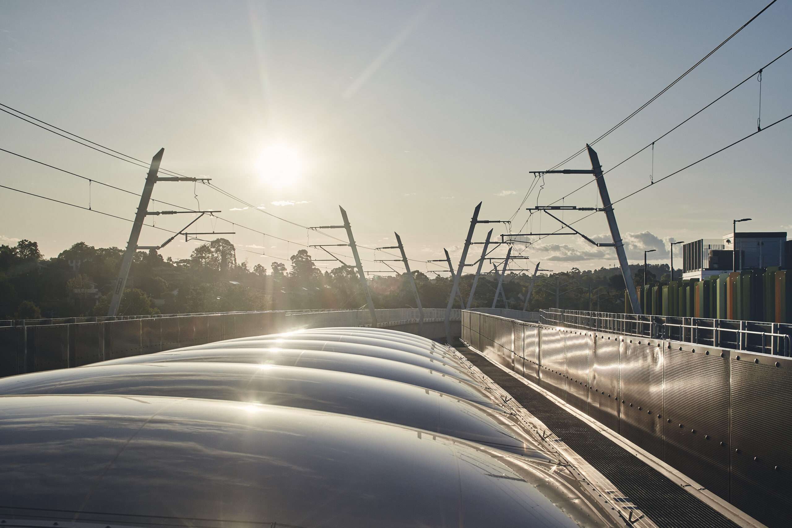 ETFE Australia: Mooroolbark Station in Melbourne features a 220 m² ETFE atrium designed for lightweight performance, daylight and movement between train tracks.